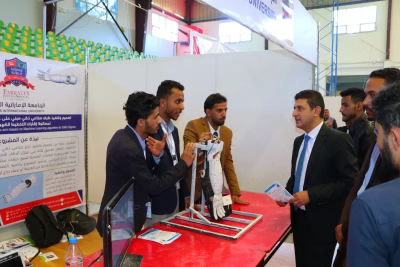 The Dean of the College of Engineering inspects the graduation projects pavilion for university students participating in the Sana’a Exhibition for Information and Communication Technology