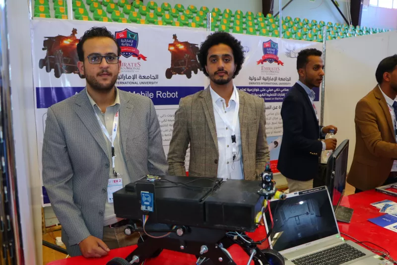 The Dean of the College of Engineering inspects the graduation projects pavilion for university students participating in the Sana’a Exhibition for Information and Communication Technology