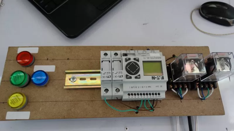 Discussing scientific projects in Programmable Logic Control or PLC for fourth-level mechatronics engineering students