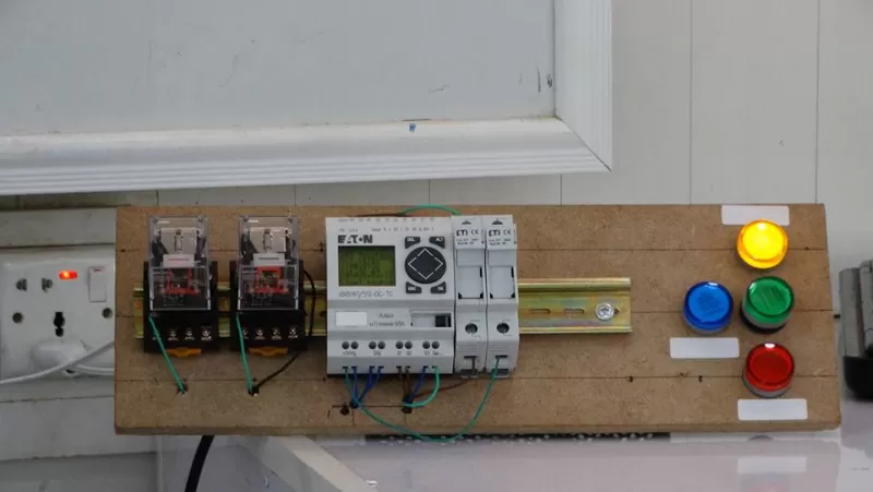 Discussing scientific projects in Programmable Logic Control or PLC for fourth-level mechatronics engineering students