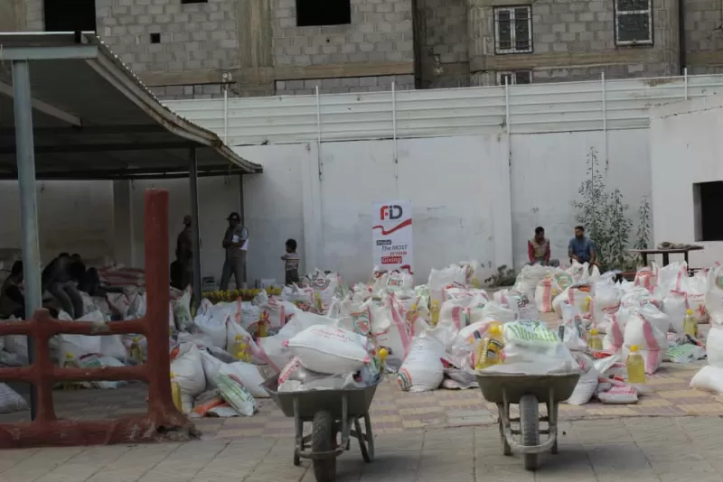 FID, in cooperation with the Emirates International University in Sana'a, distributes more than 700 food baskets to needy families