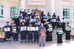 A student stand in solidarity with the Palestinian people and to denounce the crimes of the Zionist occupation